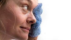 a microfiber towel to wash your face