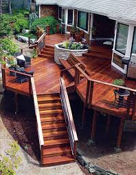 Multi Level Deck With A Stone Planter As The Focal Point