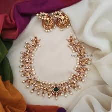 style gold replica necklace south