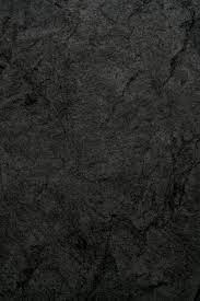 the texture of black rough stone