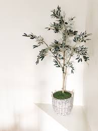 It is too small and the tree tends to lean is not on perfectly flat surface. How To Pot Your Faux Trees Bower Power