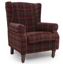 It is a beautiful accent chair that features rolled arms, a tight back, a loose seat cushion with box border welt, chunky tapered legs in a coffee finish, and a bold plaid pattern. Shetland Claret Red Tartan Fabric Wing Back Arm Chair