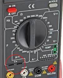 using multimeter to test a capacitor
