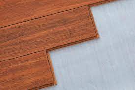 can you add padding under a hardwood floor