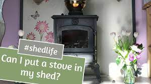 can i put a wood burning stove in my shed