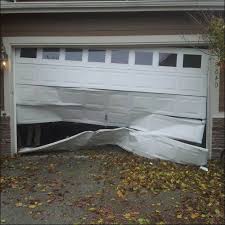 garage door panel replacement to
