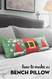 A Bench Pillow With Quilt Blocks