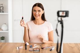 woman making makeup in front of camera
