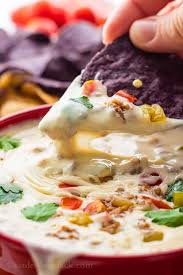 white queso dip with sausage eat