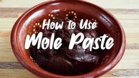 What do you add to mole paste?