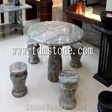 outdoor round green stone dining table