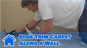 how to edge trim carpet along a wall