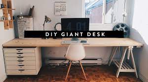 I knew we had reclaimed old wood flooring out in the scrap wood shed as well as plywood pieces left over from other remodeling projects. Diy Giant Home Office Desk Youtube