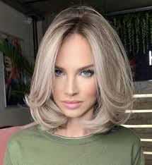 Soft blonde cut with bangs. 30 Best Hairstyles For Big Foreheads That Definitely Work Hair Adviser
