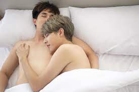 A male couple with an Asian man sleep together in a bed, a symbol of sexual  diversity, expressing openly gay men accepting LGBT concepts. 6783618 Stock  Photo at Vecteezy