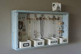 With a hanging driftwood jewelry organizer, you can keep a visual reminder of sunny summer days within arm's reach, and keep your accessories step 1: 25 Creative Solutions To Necklace Organization The Thinking Closet