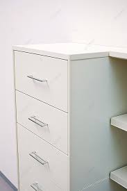 File Cabinet On A Wall Background