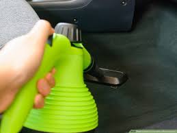 detail a car with a steam cleaner