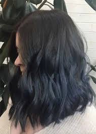 Although blue hair color was once strictly for cartoon characters or edgy punks, this cool hue has cracked its way into the realm of mainstream hair. Subtle Dark Navy Denim Denim Hair Denim Blue Hair Hair Color Blue