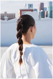 When you have reached the end of your braid, secure with your choice of hair tie. How To New Year S Eve Rope Braid Ponytail Ouai