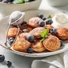 dutch poffertjes with blueberry compote