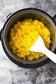 Cooking Yellow Rice In Rice Cooker gambar png