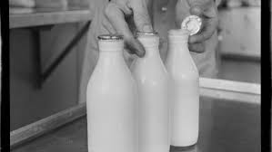 Milk Delivered To The Gate In Glass Is