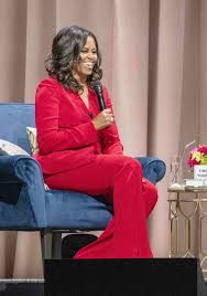 Michael kors belted sheath, a black and red ombre narciso rodriguez dress michelle obama kickstarts her book tour in the freshest way to wear denim. Michelle Obama S Best Book Tour Outfits Who What Wear