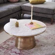 marble topped pedestal coffee table