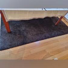 carpetes e tapetes de sala usados no