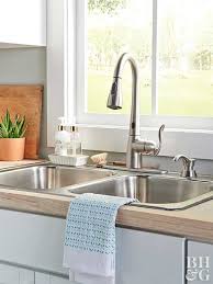 This determines the type of kitchen sink faucets that'll work with your sink — whether single or double handle and with or without accessories like a sprayer or soap dispenser. How To Install A Touchless Kitchen Faucet Better Homes Gardens