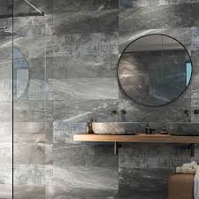 Stylish bathroom tiles at affordable prices. Novus Grey Stone Effect Wall Tiles 300 X 900mm