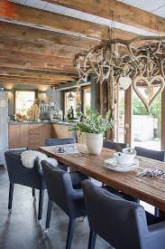 upholstered chairs around rustic dining