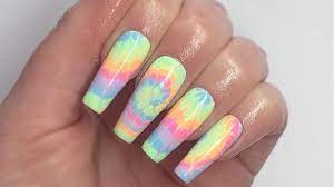 these rainbow tie dye nail art looks