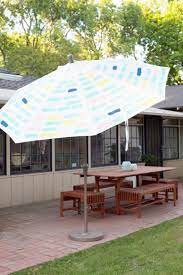 I have decided that i have a thing for fancy fringe umbrellas. 8 Easy Outdoor Umbrella Diys You Ll Like Shelterness