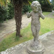 Decorative Weathered Garden Statue Of A