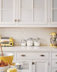 Do this even before purchasing cabinet storage solutions or trying to rearrange items. Organize Your Kitchen Cabinets In Nine Easy Steps Martha Stewart