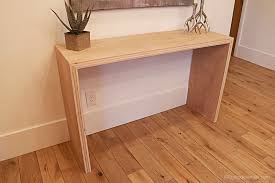 Cutting the circle for your diy round table top, from plywood or regular lumber, should be done in increments like this to prevent overloading the. Remodelaholic Diy Waterfall Plywood Console Table