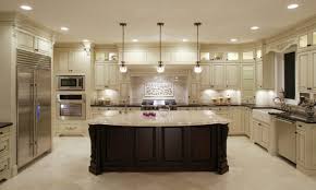 Assuming that cabinets are installed plumb and level, you'll want to hang the crown molding in a way that makes the ceiling's unevenness as unobtrusive as possible. How To Install Crown Molding On Kitchen Cabinets Cranberry Island Kitchen
