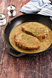 pork chops with pan gravy cooking