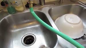 A handy addition to a kitchen sink system is a kitchen sink sprayer. How To Hook A Garden Hose To Your Indoor Faucet De Ice A Deck Thaw Containers Raised Beds Early Youtube