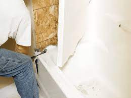 Use a thin layer of joint compound to build up the patched area to the level of the surrounding plaster. How To Install A Direct To Stud Tub Or Shower Surround