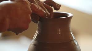 Image result for pictures of man working with clay