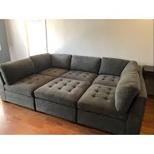 velvet grey three seater wooden sofa at
