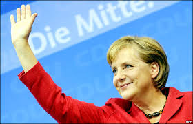 The pale background bespeaks the unknown future. Angela Merkel Biography