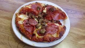 meat marvel round table pizza