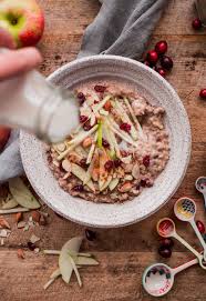 slow cooker steel cut oats with apple and cranberries a beautiful plate