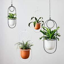 Helping you express your style through modern design. Paperclip Hanging Planters