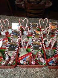 See more ideas about christmas gifts, gifts, homemade gifts. Christmas Baskets For Staff Small Yankee Candles With A Gift Card Hot Glued On Candy Canes Hot Homemade Christmas Gifts Christmas Baskets Diy Christmas Gifts