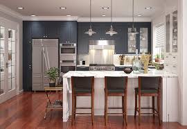 In this gorgeous room with blue painted kitchen cabinets, proportion and scale are evident everywhere: Design Trend Navy Blue Kitchen Cabinets
